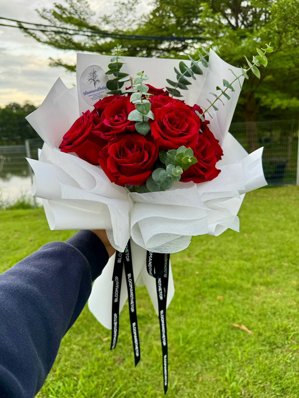 RED KENYAN ROSES WITH EUCALYPTUS
