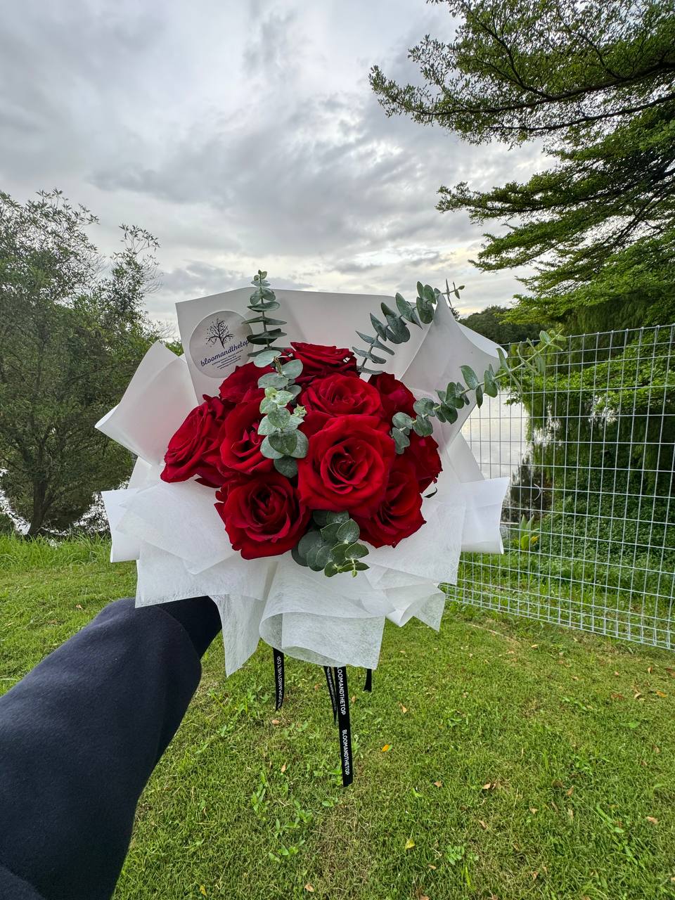 RED KENYAN ROSES WITH EUCALYPTUS